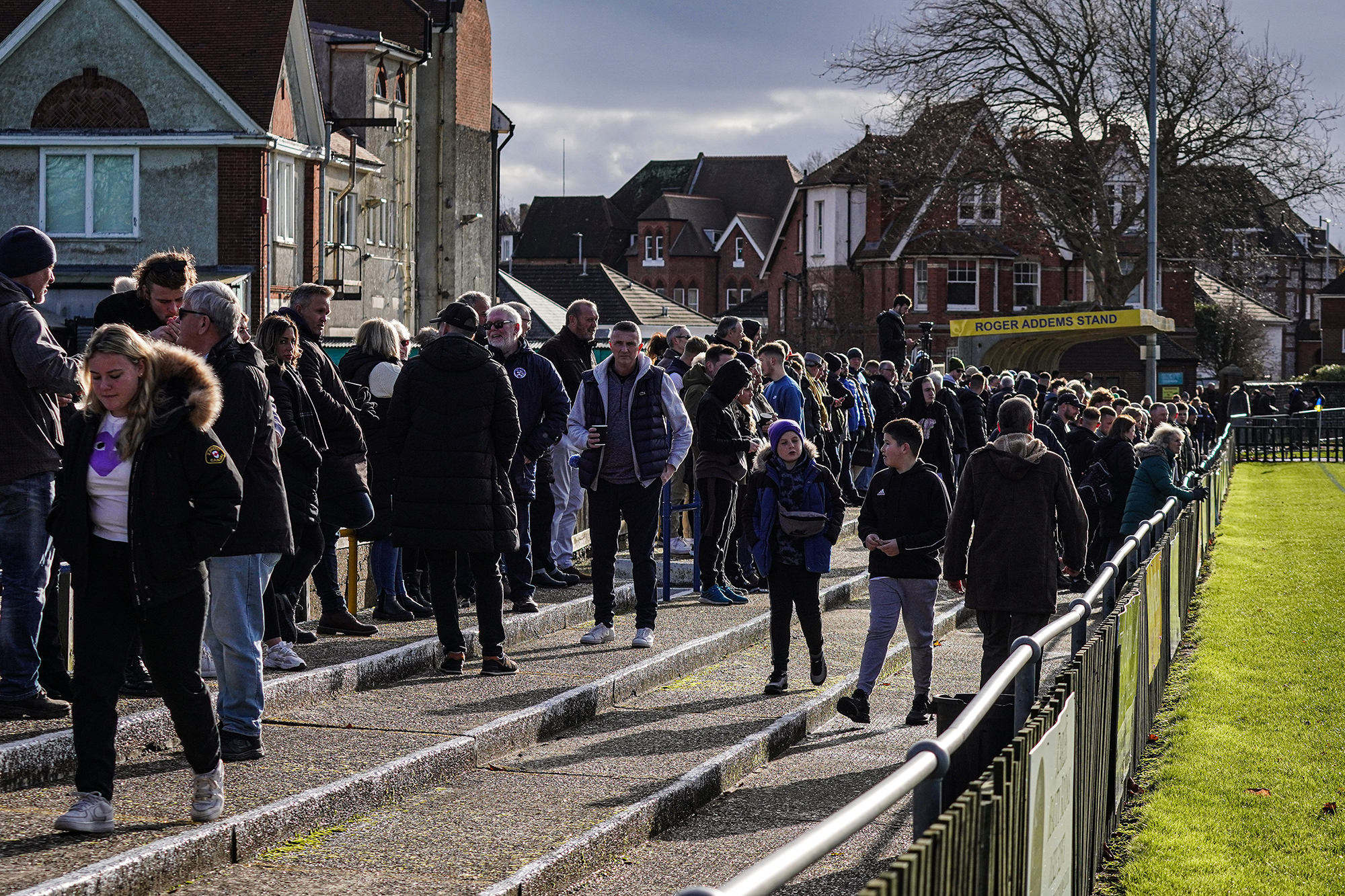 A large crown of supporters at Eastbourne Town Footbsall Club to watch the boxing day derby.