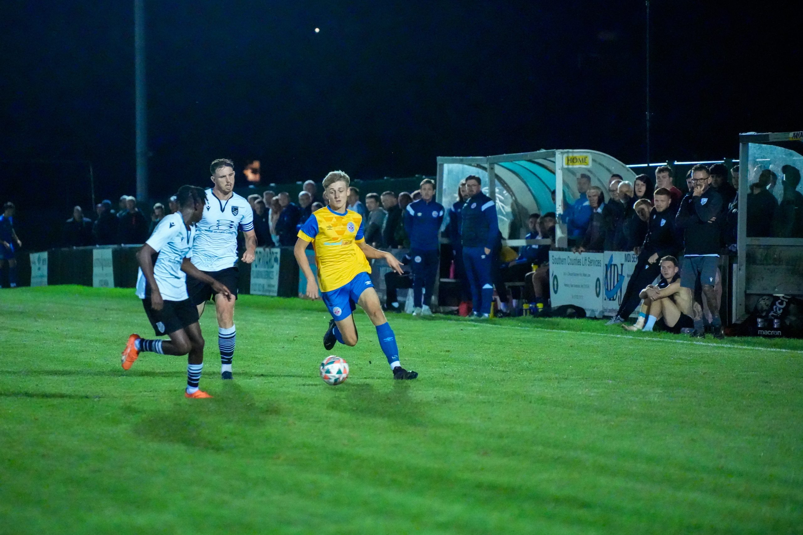 Matthew Myall running down the wing against Bexhill United.