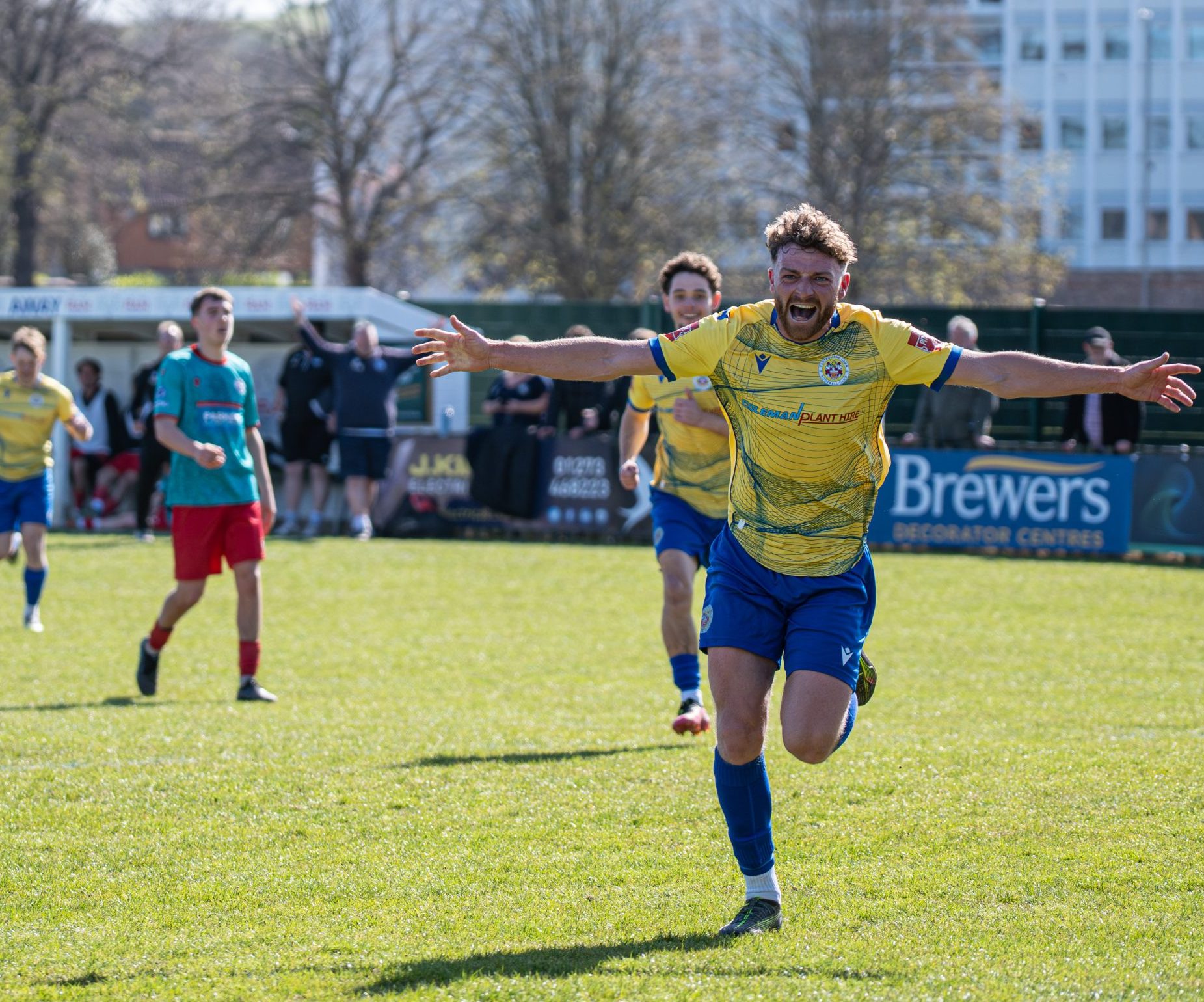 Aaron Capon sprints off to celebrate his goal and winner versus Crowborough Athletic